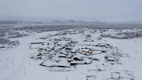 Aerial view of snow covered houses, Russia.