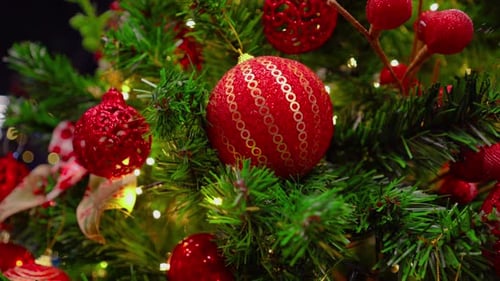 Red Christmas Ornaments on Green Christmas Tree