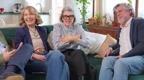 Group of Senior Friends Laughing and Talking Together
