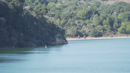 Stand-up Paddleboarding on a Calm Coastal Bay