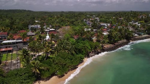 Tropical holiday destination coastline ocean beautiful relaxing beach aerial drone