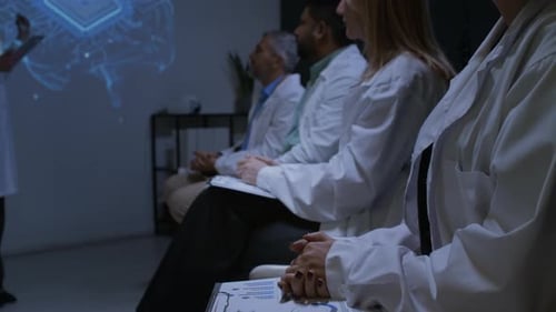 Group of Healthcare Professionals Applauding to Speaker at Conference