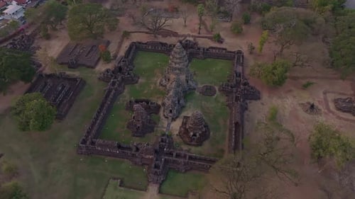 Drone flying above ancient Khmer temple in Phimai Thailand