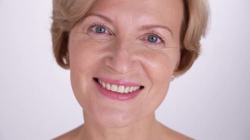 Close Up of Smiling Woman with Blonde Hair