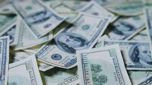 Pile of Crisp One Hundred Dollar Bills