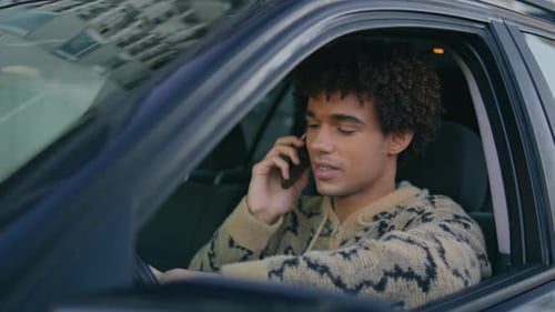 Driver Enjoy Phone Call in Car Ready to Drive Closeup Latino Hipster Mobile