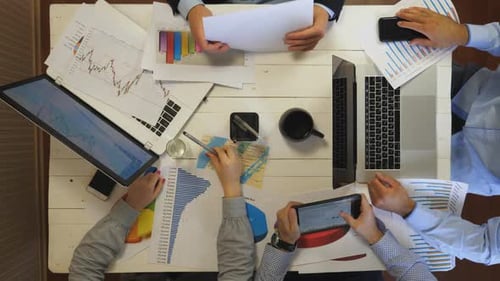 Business Team Analyzing Data at a Table