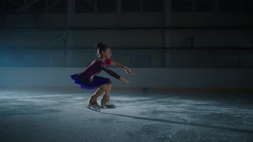 Girl Ice Skating and Figure Skating in Rink