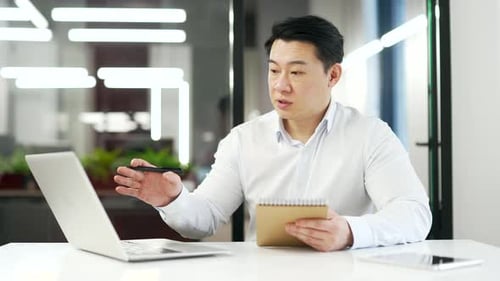 Office Worker Attending Online Business Meeting