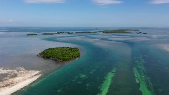 Aerial panoramic view of group of small islands and islets with ...