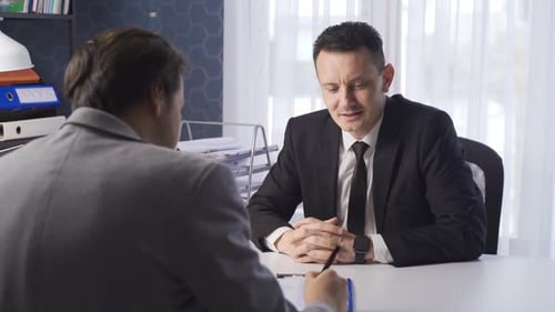 Adults Meeting in Modern Corporate Office