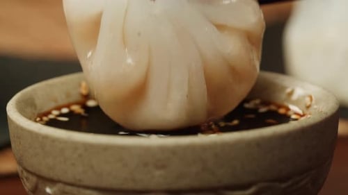 Dipping Dimsun Into Soy Sauce Closeup Macro Dim Sun Gedza Dumplings Spring Rolls on the Table Food