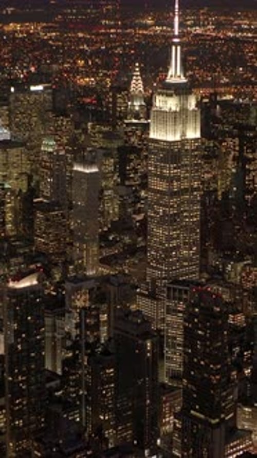 The New York City Skyline Illuminated Beautifully at Night is Truly Captivating and Iconic