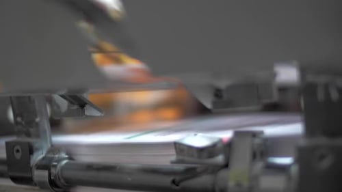 Close up of Print Sheets Offset Printing Press