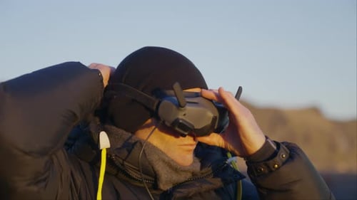 Man With FPV Goggles Near Reynisfjall Mountain In Iceland
