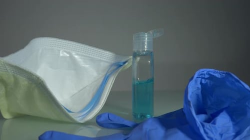 Medical Mask, Gloves, and Hand Sanitizer Close Up
