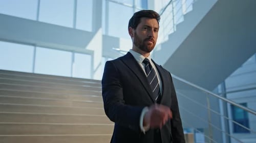 Confident Leader Pointing Camera Standing on Stairs Corporate Building Closeup