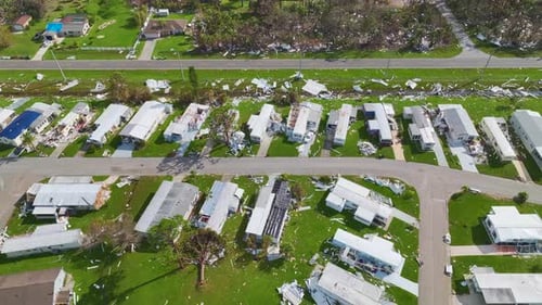 Severely Damaged Houses After Hurricane Ian in Florida Mobile Home Residential Area Consequences of