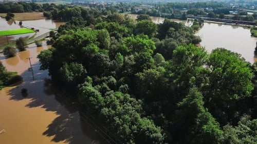 Flooded Rural Area with Trees Houses and Buildings After Heavy Rainfall Aerial View