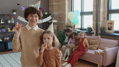 Family Birthday Party Celebration Indoors with Balloons and Gifts