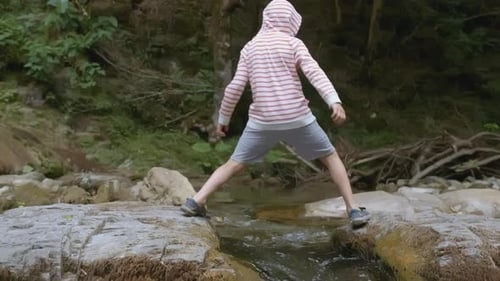 Boy Walks in Wild Forest in Summer Creative Boy Enjoys and Has Fun Walking in Wild Forest in Summer