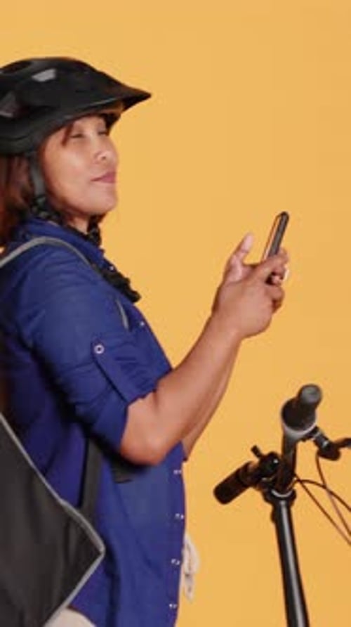 Bicyclist Using Cellphone in Studio