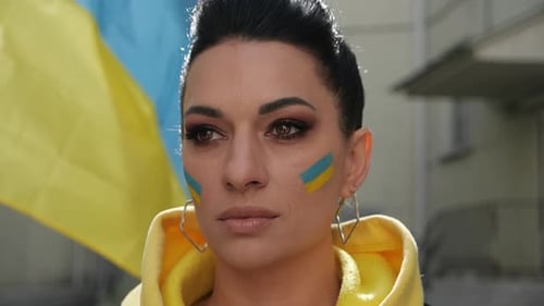 A Woman's Face with the Symbols of Ukraine