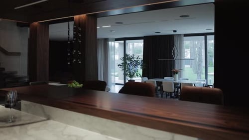 This is a Modern Interior View That Showcases the Connection From the Kitchen to the Living Space