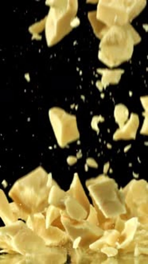 Super Slow Motion Pieces of White Chocolate Filmed on a Highspeed Camera at 1000 Fps