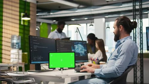 Technician Developing Applications Using Chroma Key Tablet Integrating AI