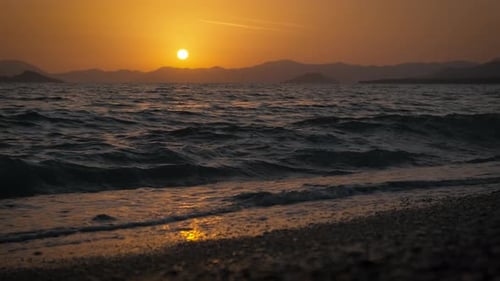 Waves at Golden Hour on a Quiet Beach