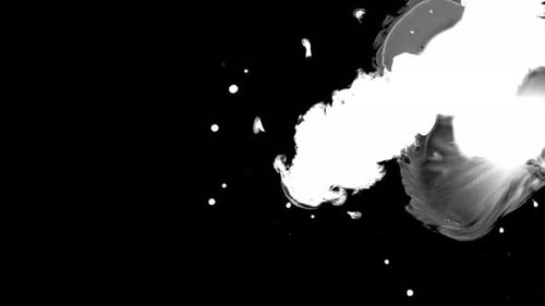 White Ink Bursting on Black Background