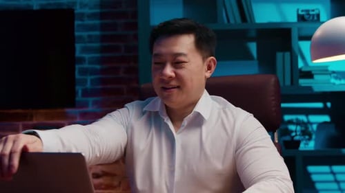 Successful Korean Businessman Asian Business Man Close Laptop Finish Work Relaxing at Evening Office