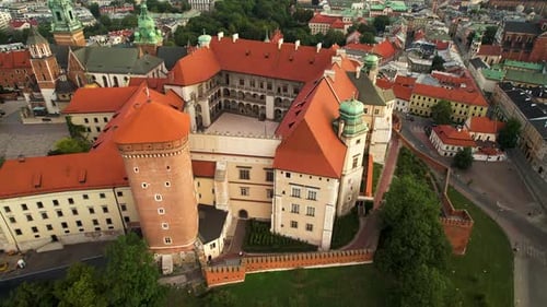 Exterior Of Historic Wawel Royal Castle At Sunrise -Royal Garden. UNESCO World Heritage Site In Krak