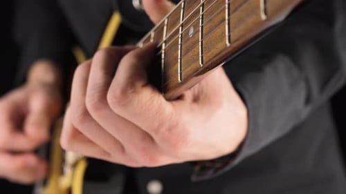 Hands Play Electric Guitar Close Up