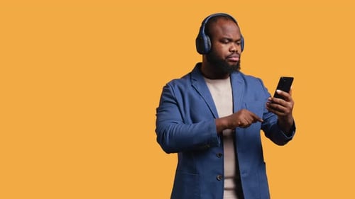 Relaxed Person Selecting Songs From Playlist Studio Background