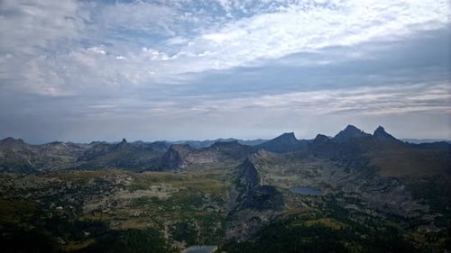 Clouds Moving Over Mountain Lake Timelapse