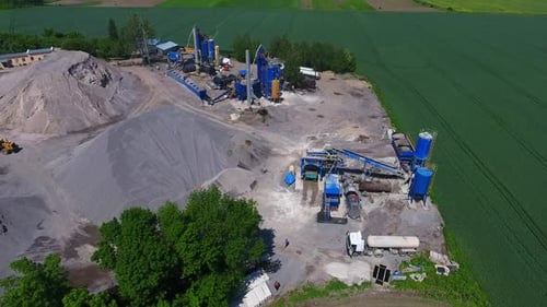 Construction of Roads. asphalt production plant. dropout, rubble and sand warehouses