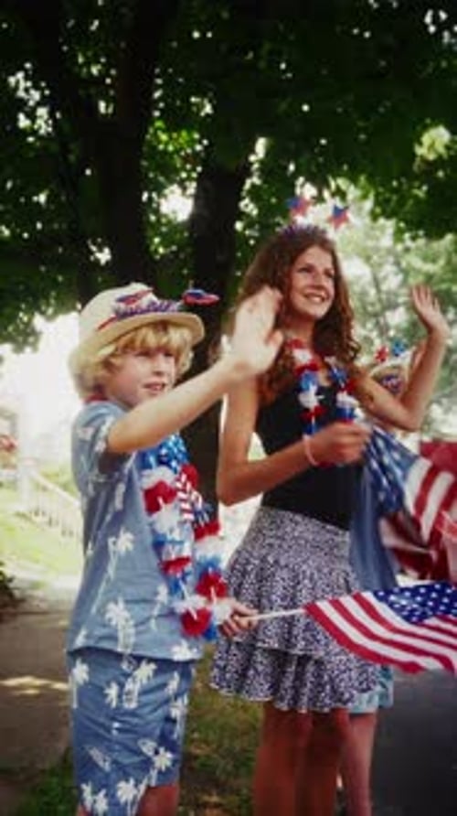 People Waving Flags on Fourth of July