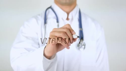 Vitamin A Doctor Writing on Glass
