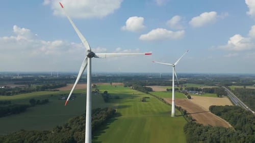 Aerial View of Wind Turbines in Rural Landscape