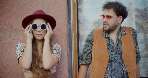 Trendy Young Adults Posing in Urban Environment