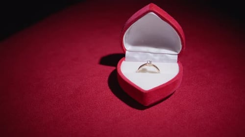 Gold Ring with Diamond in Heart Shaped Box