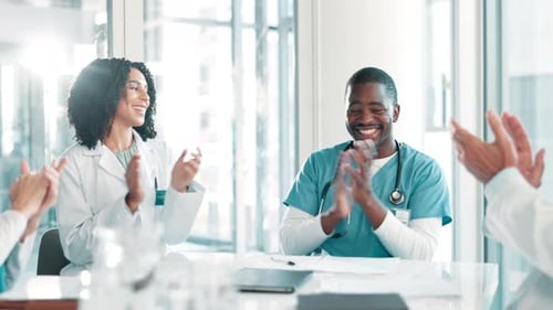Applause, meeting and team of doctors and nurses in celebration, success and hospital discovery