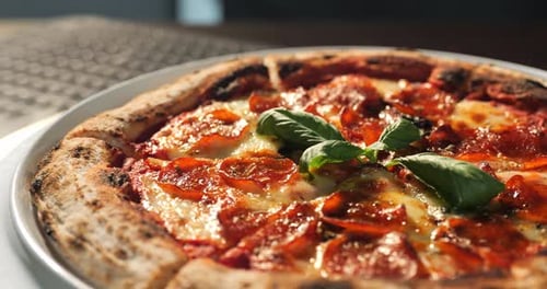 Delicious Pepperoni Pizza With Fresh Basil