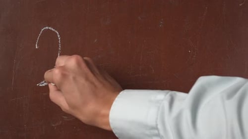 Simple Math Equation Written in Chalk