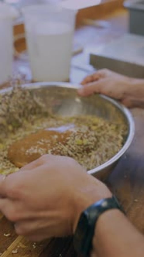 Mixing Seeds and Ingredients in Kitchen Bowl
