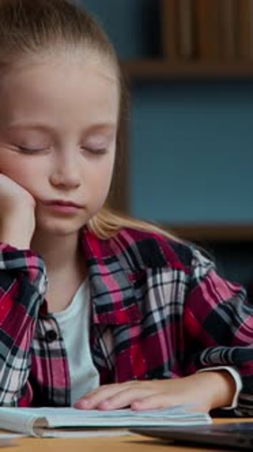 Tired Caucasian Little Girl Child Kid Daughter Studying Online at Home Napping Sleeping Exhausted