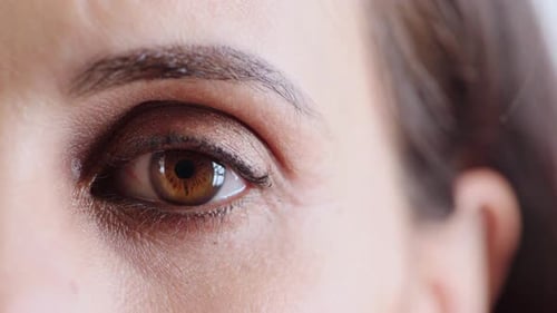 Woman, face and eye zoom portrait for optical treatment, vision wellness and facial microblading