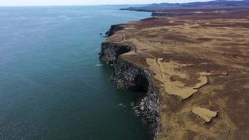 Aerial view of Krysuvikurberg cliffs along the coast in Iceland.